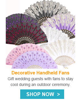 Gift wedding guests with fans to stay cool during an outdoor ceremony.