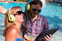 Lounging by the pool sharing MTX Audio Headphones from one music source!