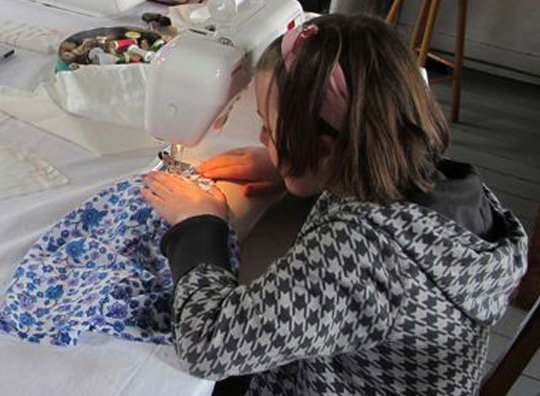 Girl Sewing