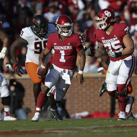 Oklahoma quarterback Kyler Murray runs during the...