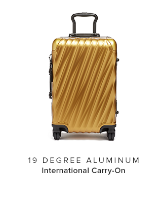 tumi gold luggage