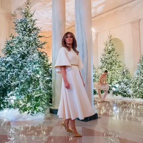 First lady Melania Trump stands in the Grand Foyer