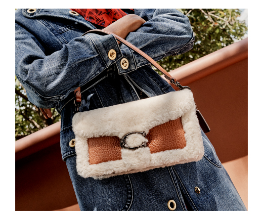 coach shearling wristlet