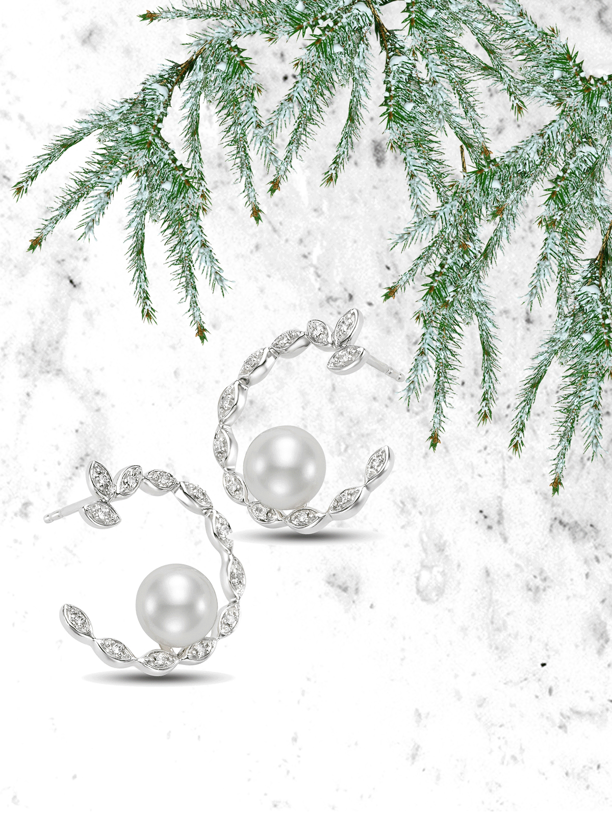 mastoloni diamond wreath pearl hoop earrings in white gold under a christmas tree