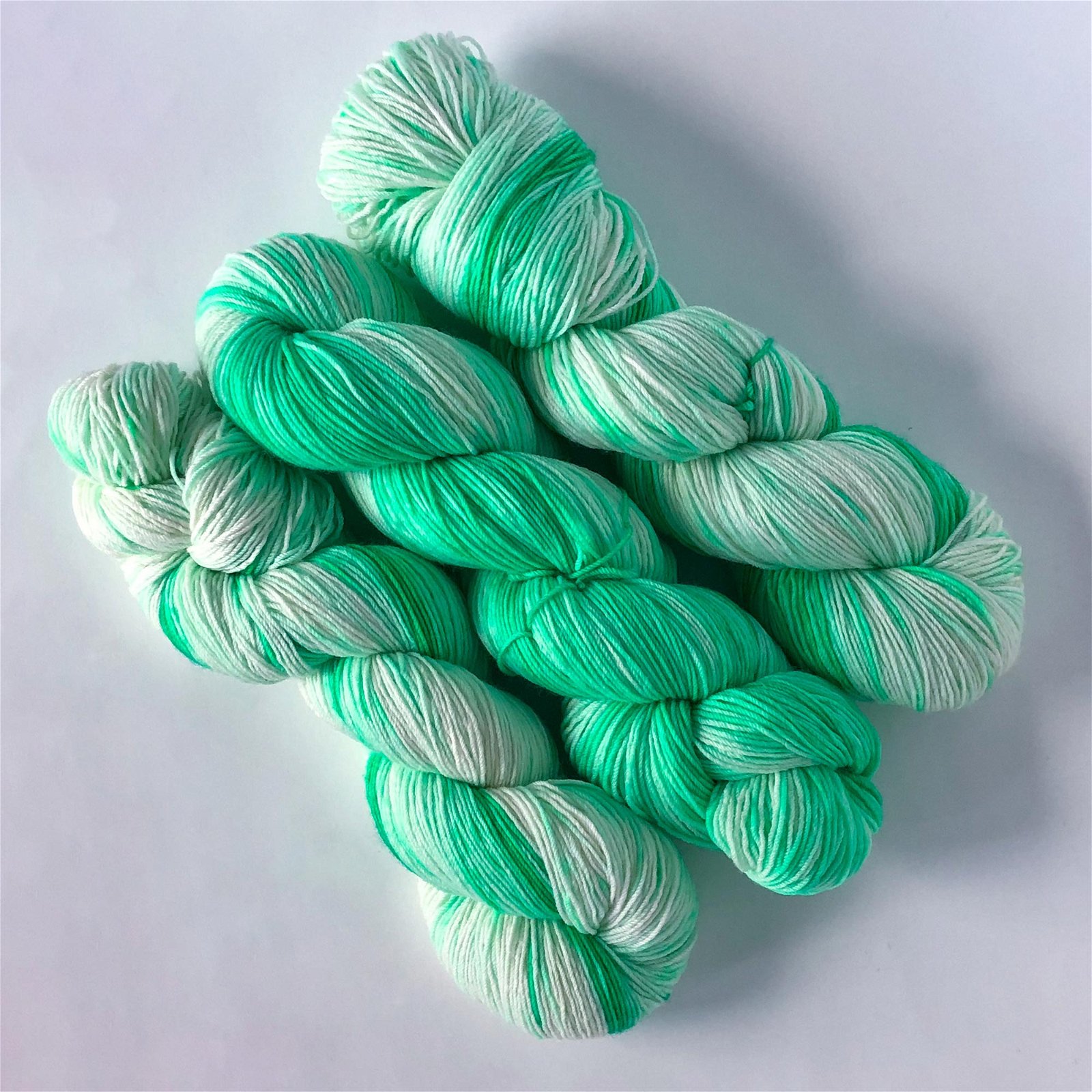 Lime 'n Coconut Sock Yarn in Green and White -- Hand Dyed Extrafine Merino Wool Blend