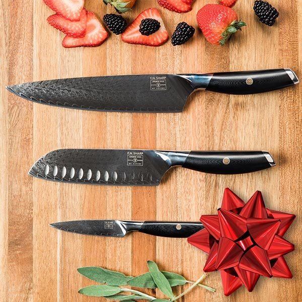 3 knife set on cutting board