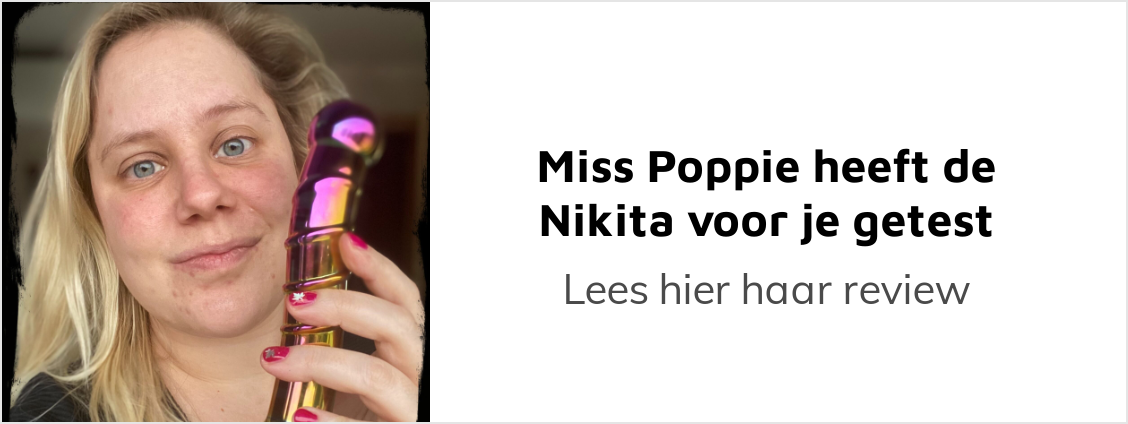 Miss Poppie holding the Sensual Glass Nikita