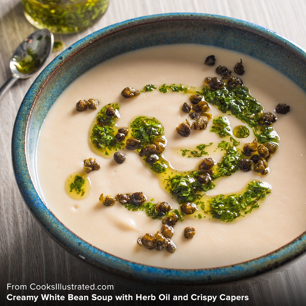 From CooksIllustrated.com, Creamy White Bean Soup with Herb Oil and Crispy Capers