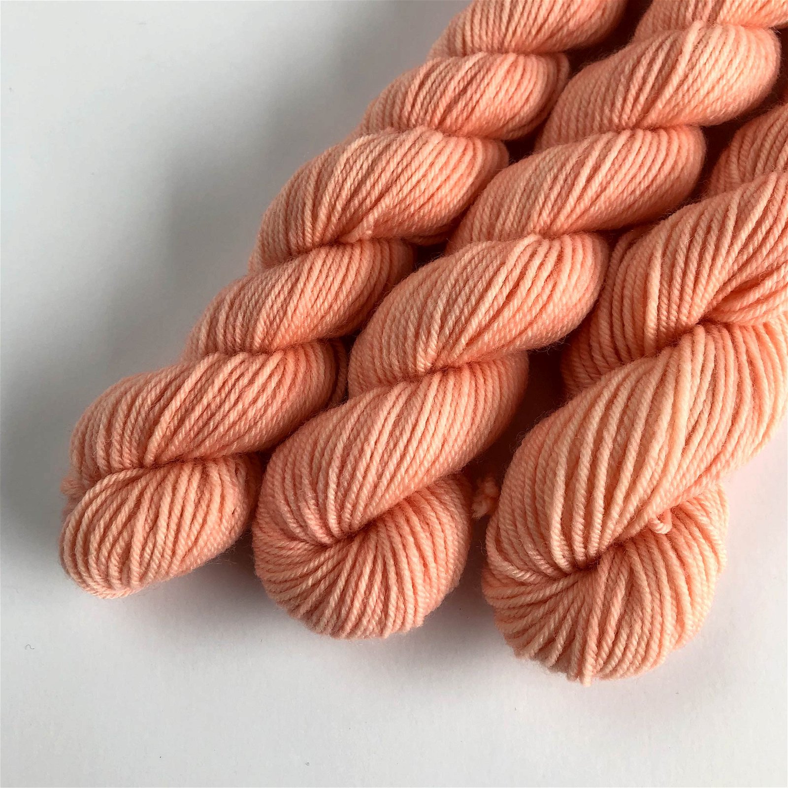 Image of Light Coral Extrafine Merino Sock Yarn Mini Skein