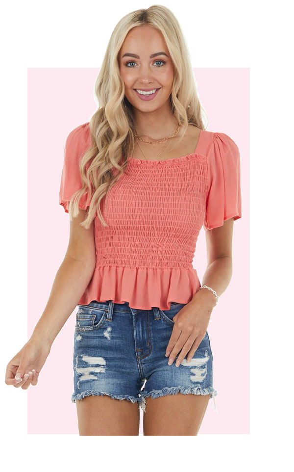 Coral Short Flutter Sleeve Blouse With Smocked Detail