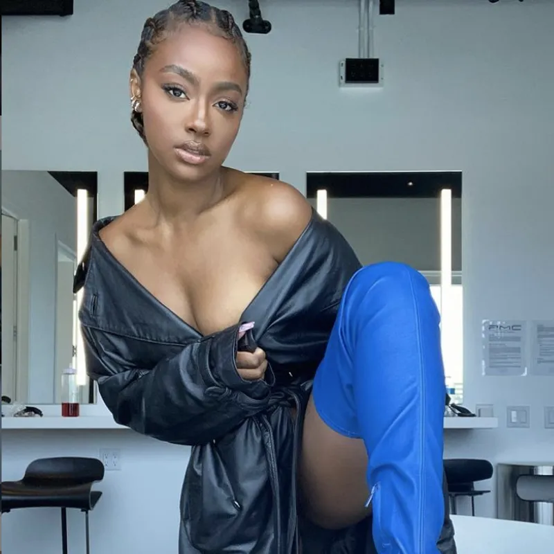 Image may contain: Clothing, Apparel, Human, Person, Evening Dress, Fashion, Gown, Robe, Sleeve, and Justine Skye