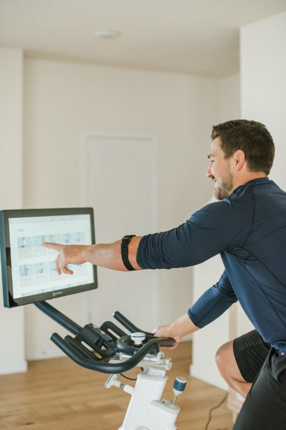 Man selecting workout