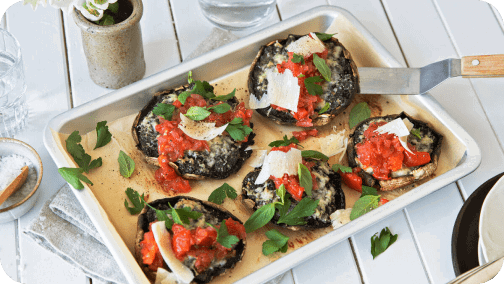 Stuffed portobello mushrooms with tomato ragù