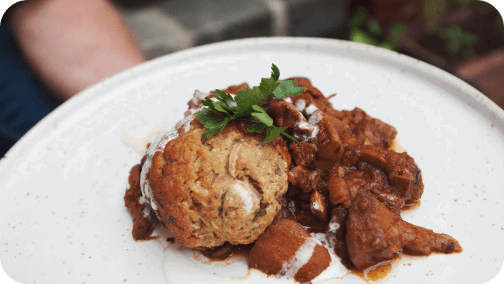 Smoky mushroom goulash with bread dumplings