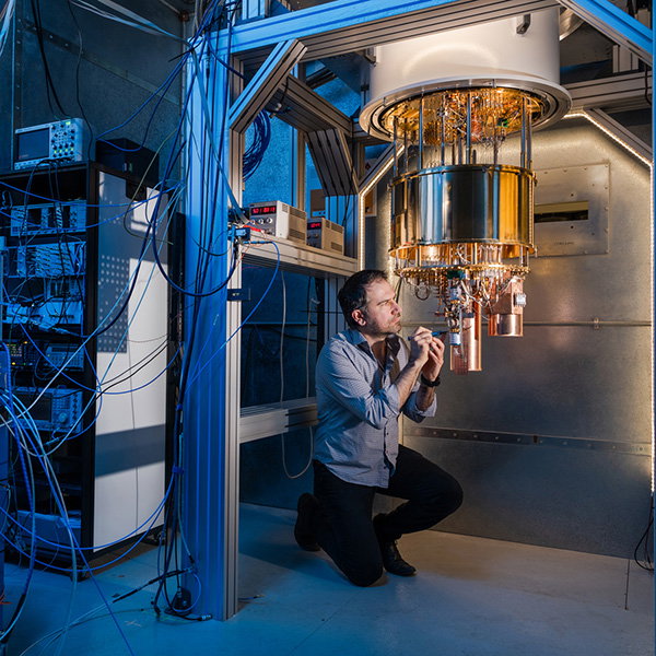 Alessandro Rossi, quantum scientist from the UK NPL and the University of Strathclyde working on a dilution refrigerator system.