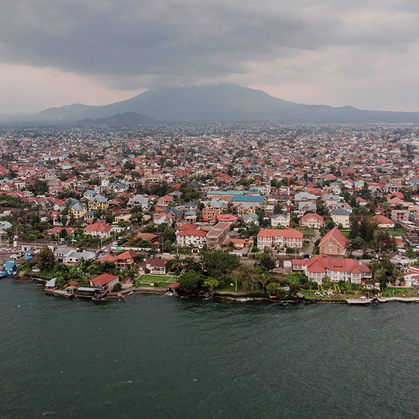 Aerial view of Goma with Nyiragongo Volcano in the background.