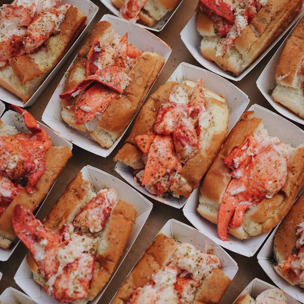 Mini lobster rolls in a catering tray