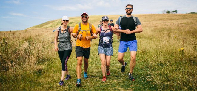 A group of people hiking through the countryside