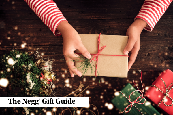 Child Holding a Negg® Egg Peeler Wrapped for the Holiday