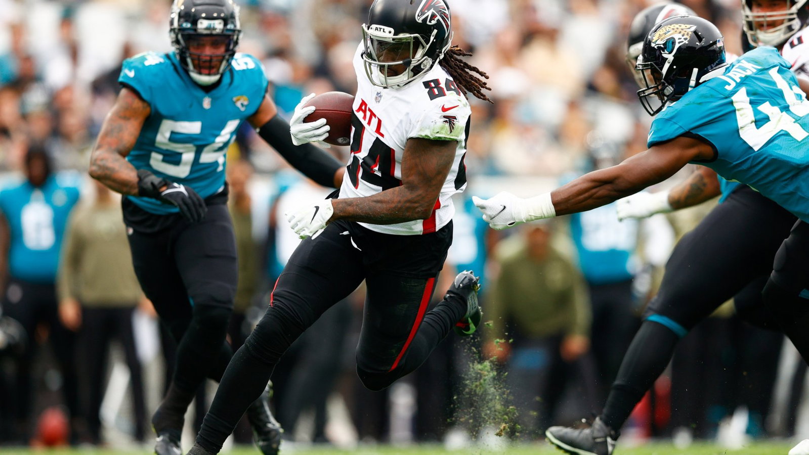 Atlanta Falcons running back Cordarrelle Patterson (84) runs with the ball in the first half against the Jacksonville Jaguars at TIAA Bank Field.