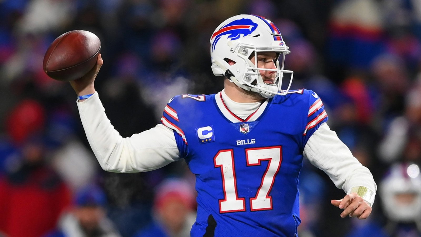 Buffalo Bills quarterback Josh Allen (17) throws during the third quarter of the AFC Wild Card playoff game against the New England Patriots at Highmark Stadium.