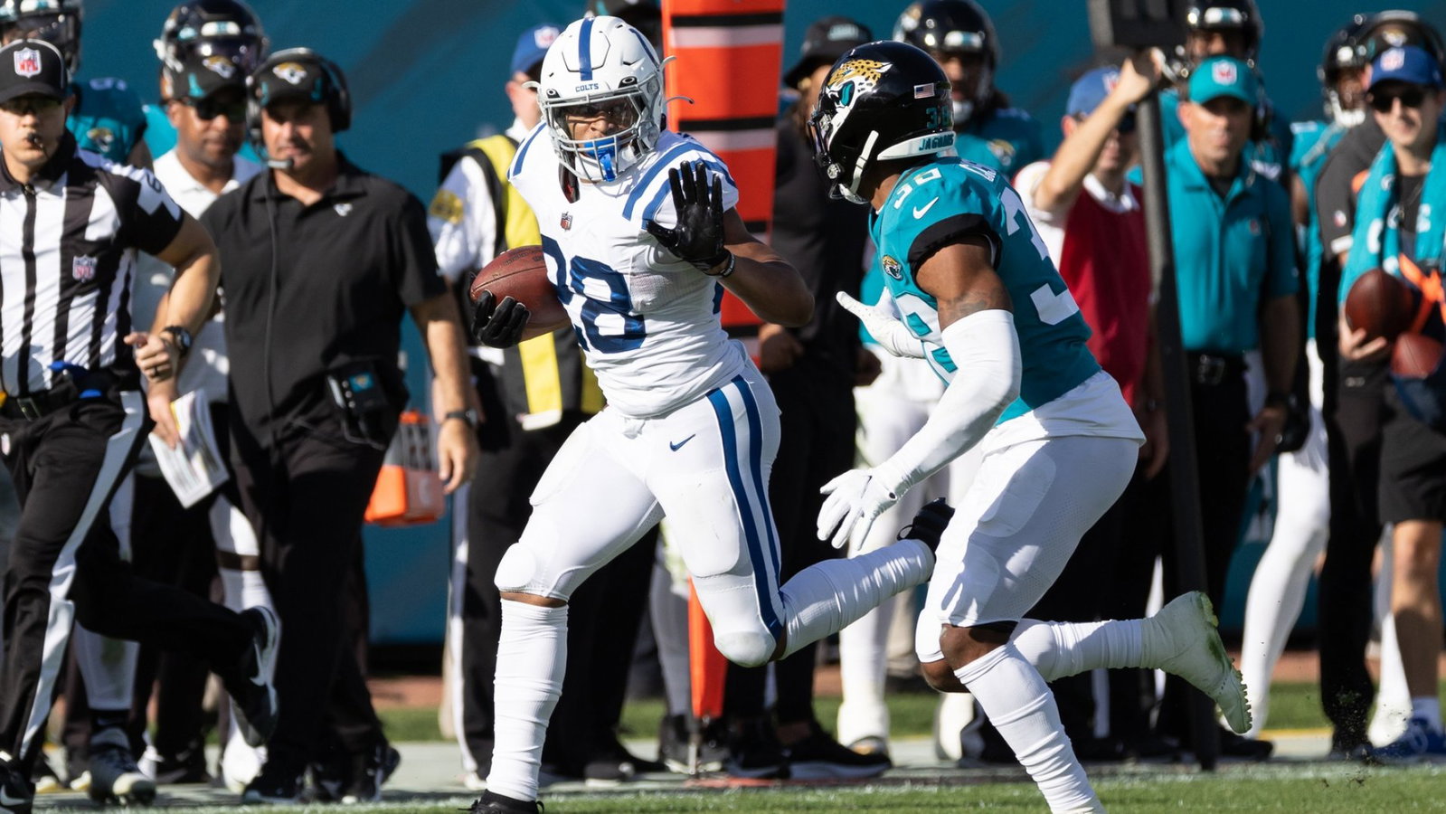Indianapolis Colts running back Jonathan Taylor (28) stiff arms during the second half against the Jacksonville Jaguars at TIAA Bank Field.