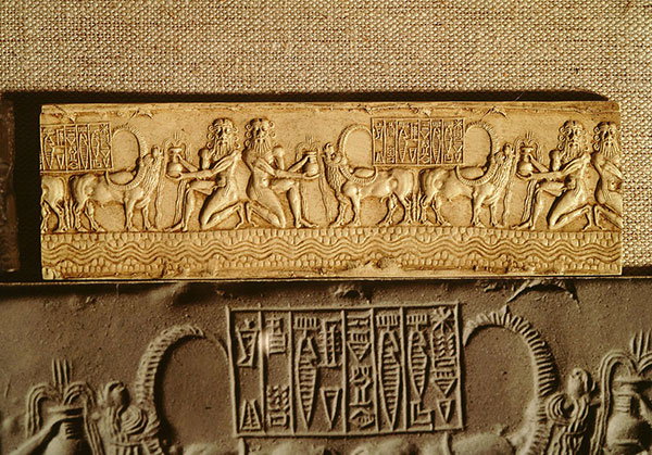 Relief created from a cylinder seal from the Akkad dynasty showing water gods and buffalo