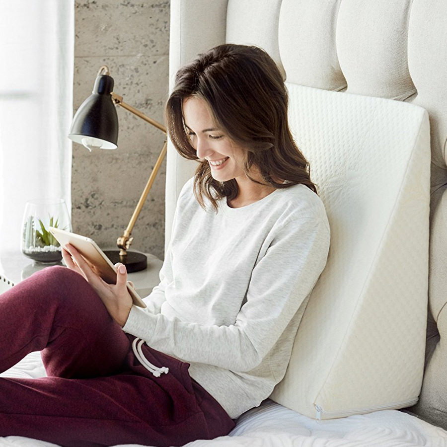 Girl reading on her Zuma wedge foam pillow