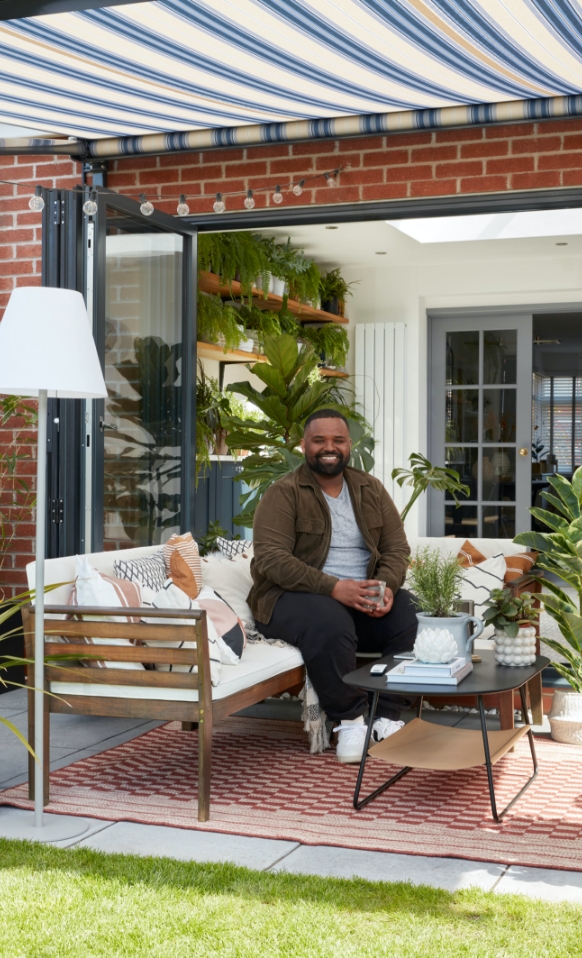 Mo sat on his porch with the awaning open overhead