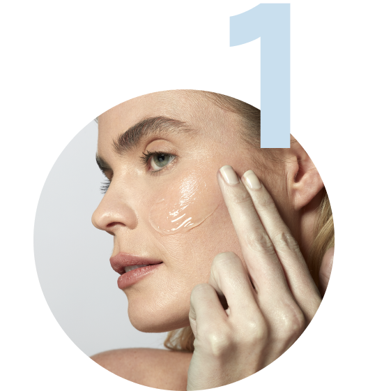 Model applying Activator to her face prior to conducting the Lift Routine