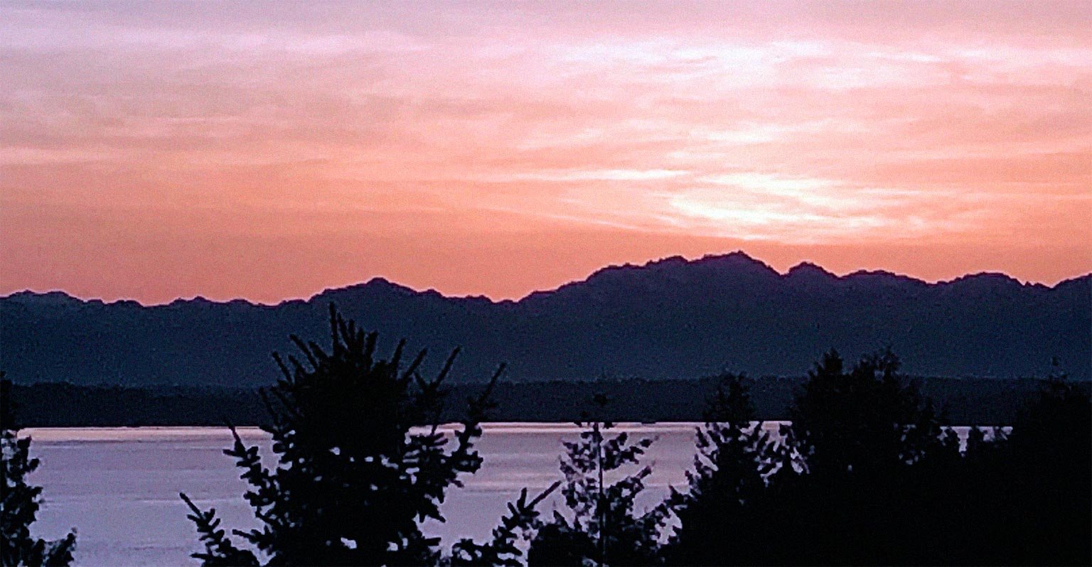 Sunset view from our old house in West Seattle. We miss it! 