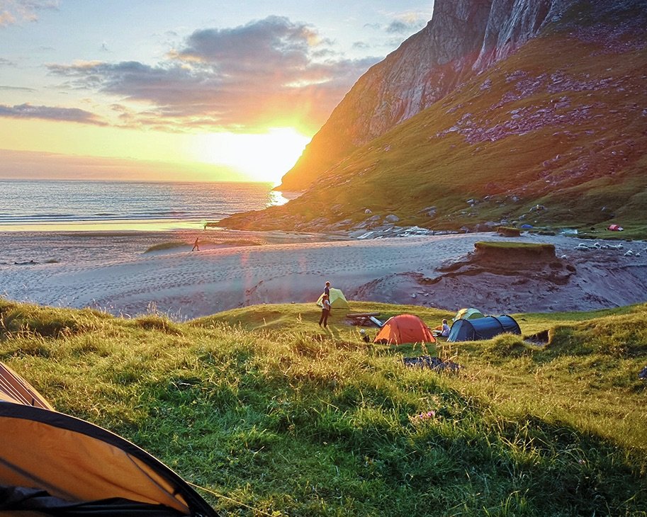 Sunset over a beach campsite