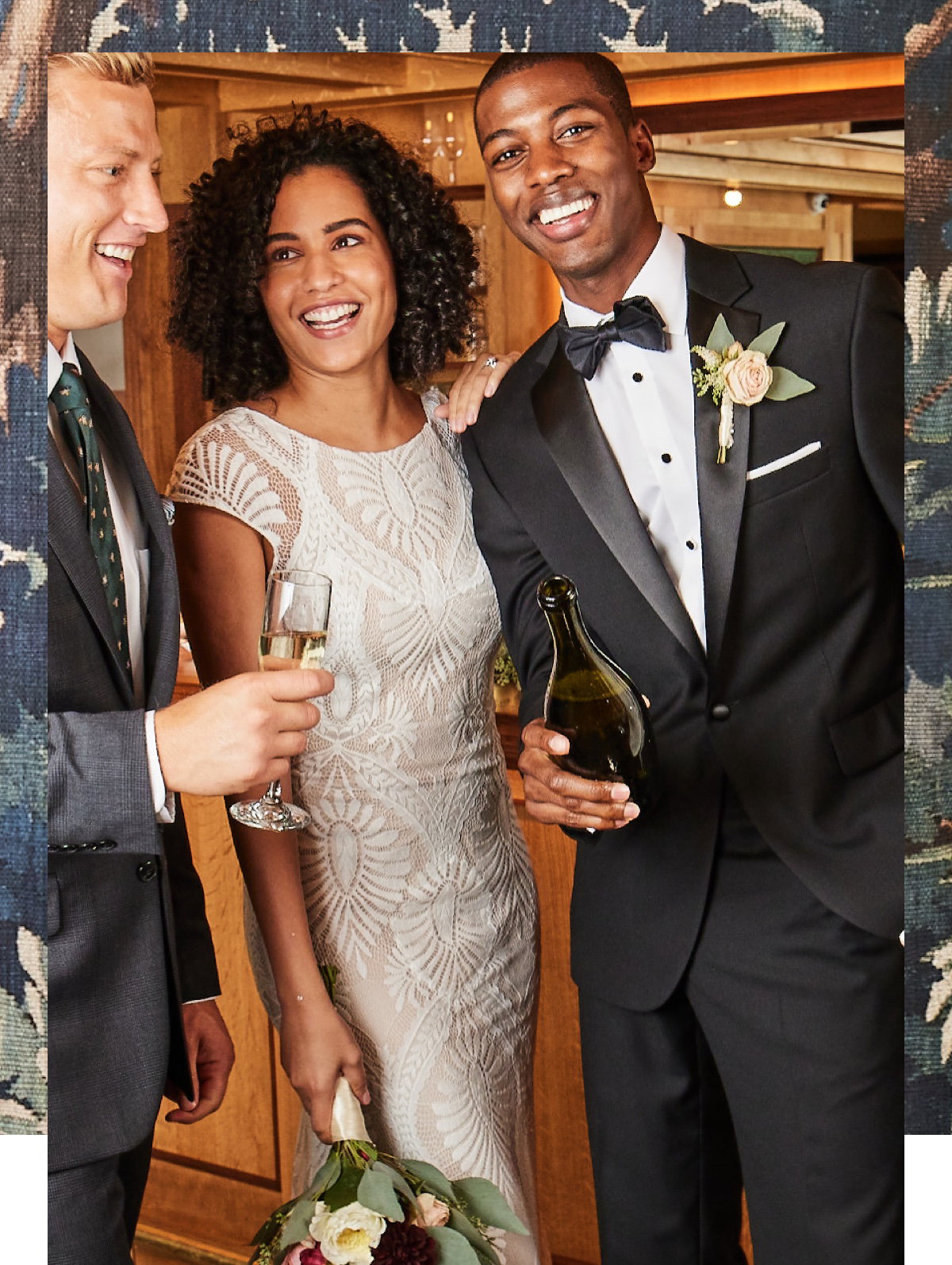 newly married husband and wife with a man holding a glass of champagne on the left