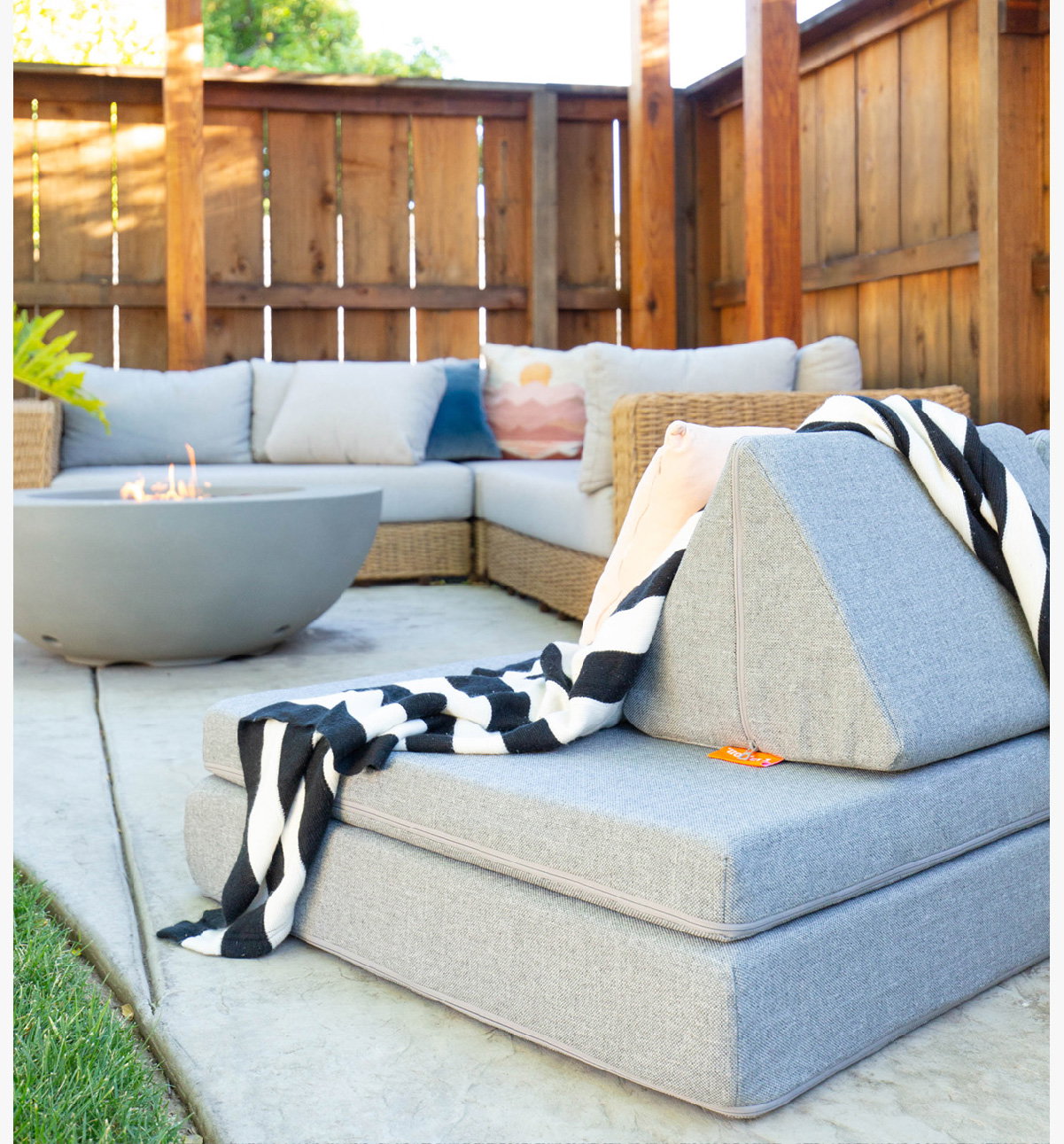 The Outdoor Nugget blends in seamlessly with other outdoor furniture on a patio. 