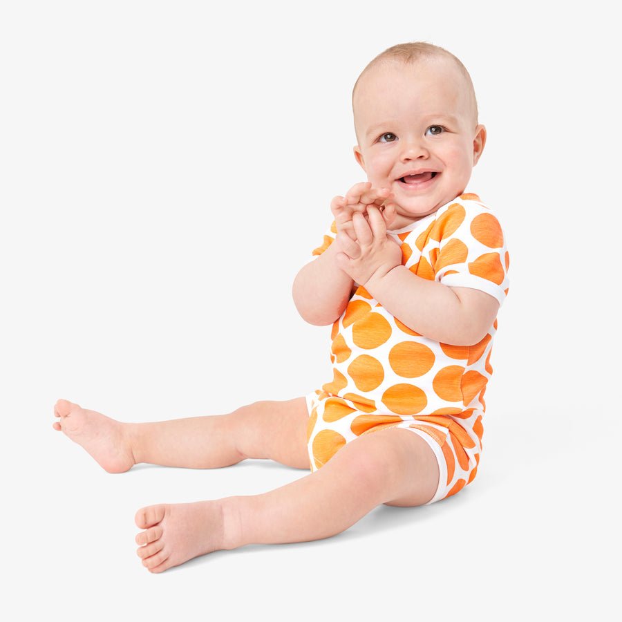 Baby organic short sleeve romper in cutout dot