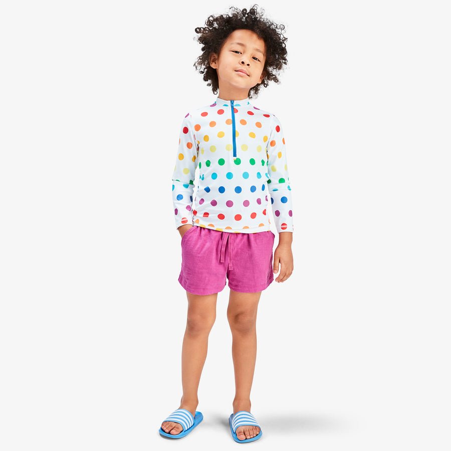 Kids long sleeve half-zip rashguard in rainbow dot