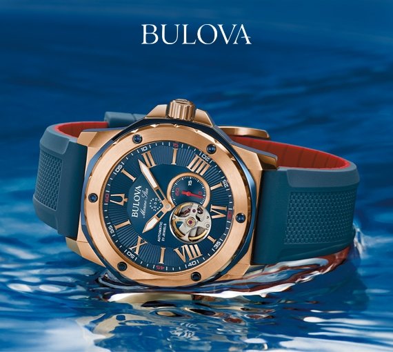 Image of Bulova Marine Star Automatic men's watch laying in a pool of water