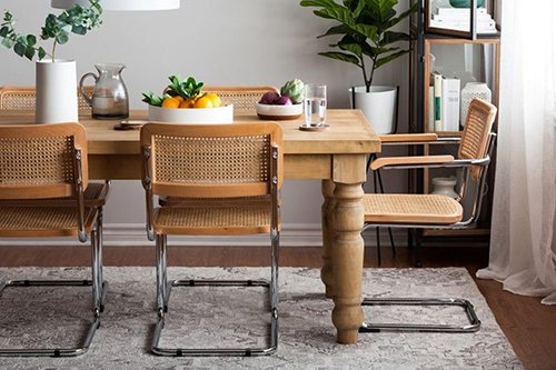 A Brief History of the Dining Chair You’re Seeing Everywhere