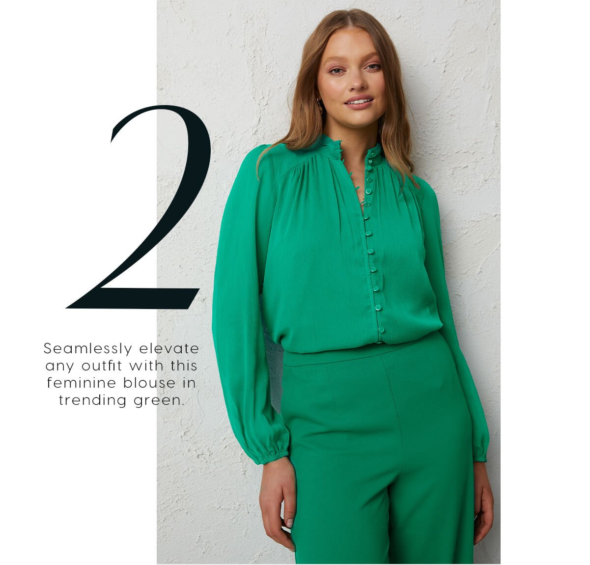 2. Seamlessly elevate any outfit with this feminine blouse in trending green.