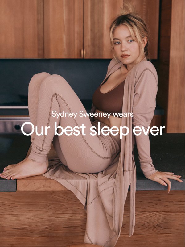 Sydney Sweeney wears out best sleep ever. Click to Shop the Luxe Edit.