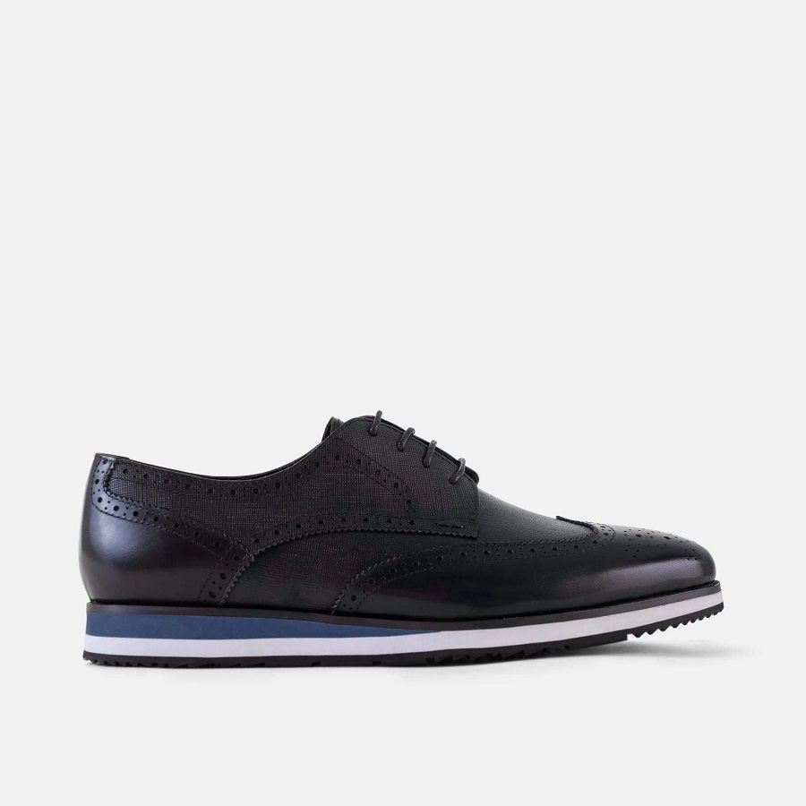 Marc Nolan: Full-grain leather wingtip sneakers | Milled