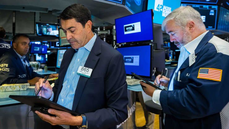 Traders on the floor of the NYSE, Aug. 11, 2022.