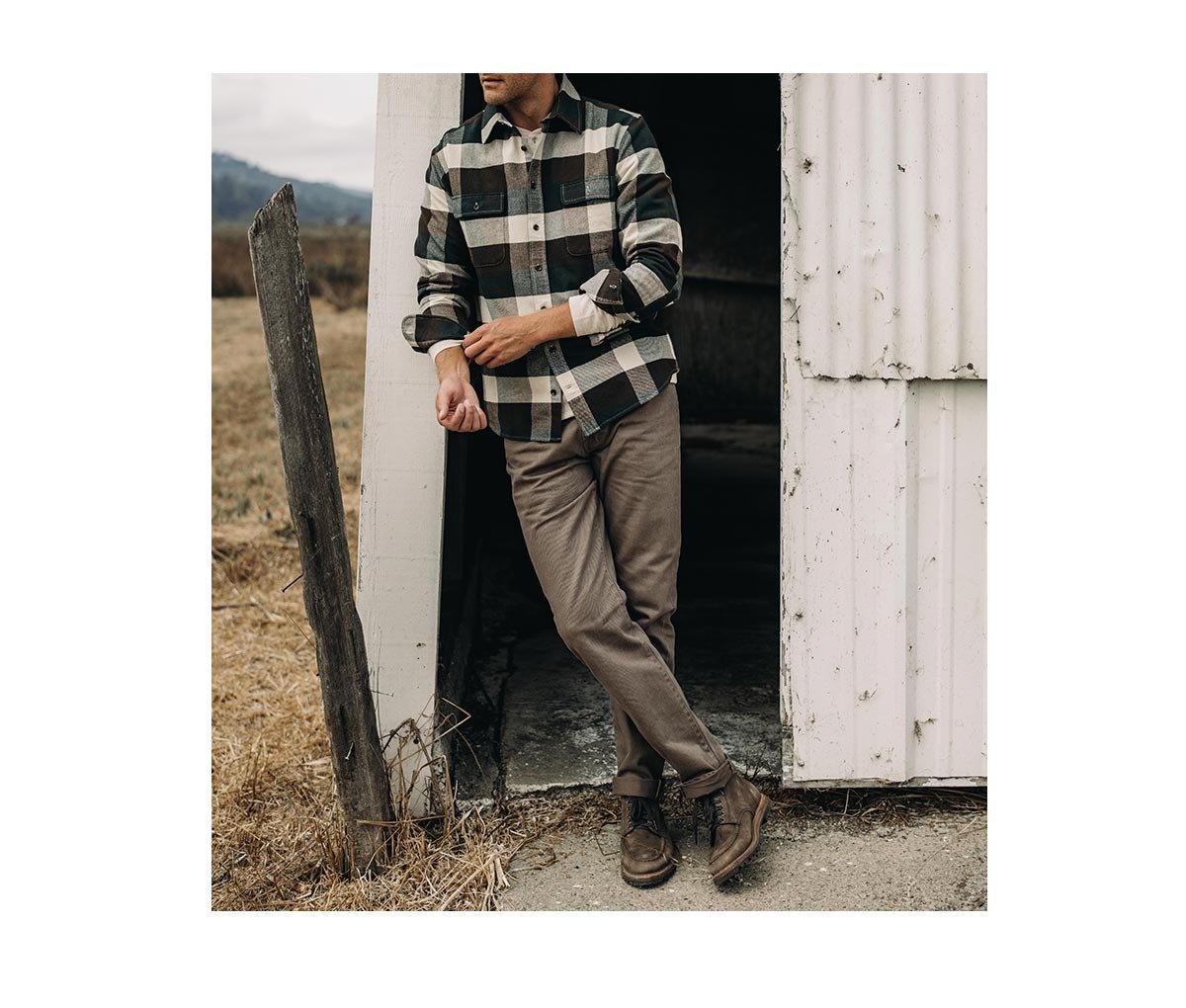 Model wearing The Slim All Day Pant in Washed Walnut Selvage