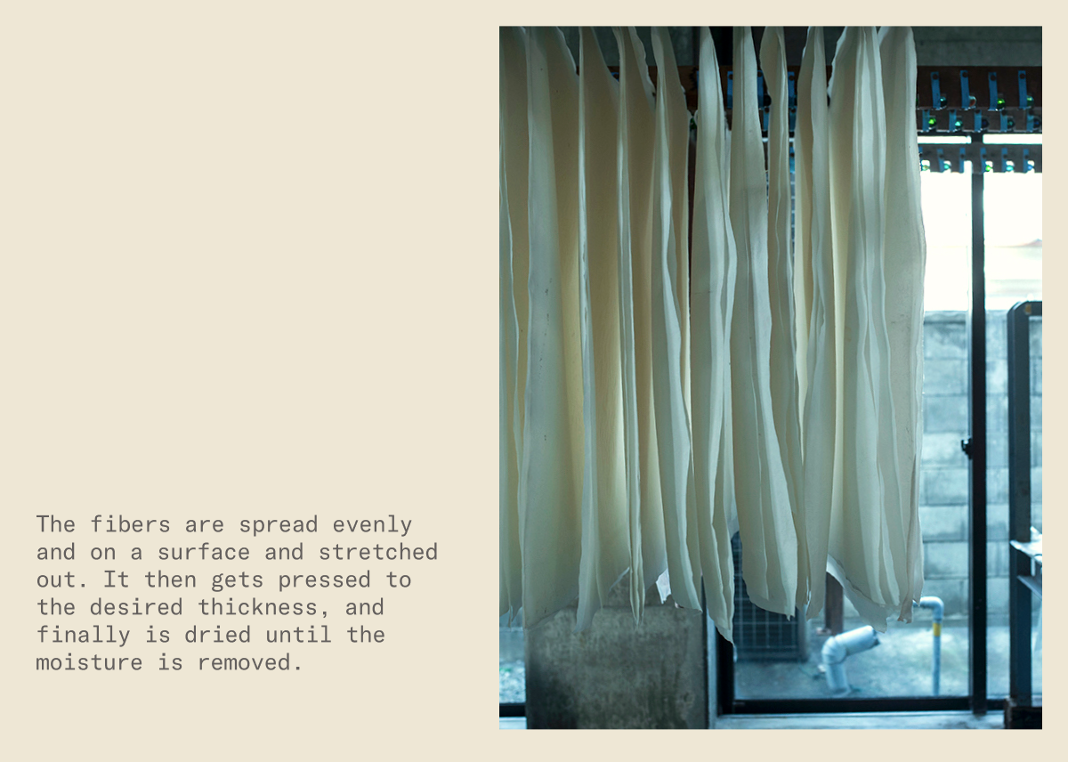The fibers are spread evenly and on a surface and stretched out.