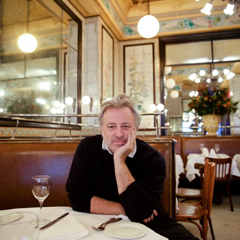 Keith McNally sitting in Augustine