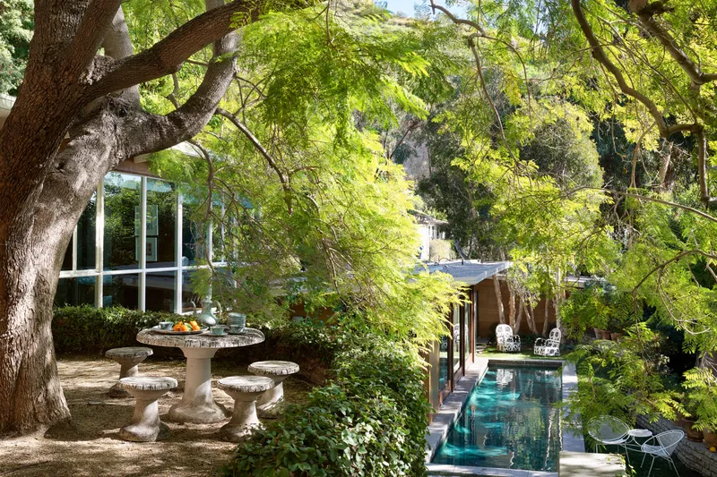 an outdoor garden and pool