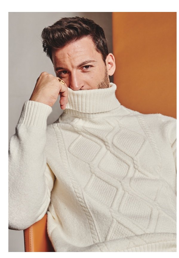 Man in cable knit turtleneck