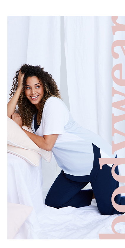 Contrast Detail Pajama Set - soft cotton knit for nights of total comfort/ Top with contrast layer V-neck, short sleeves, faux wrap front, and contrast trim asymmetric hem. Solid elastic waist bottoms.