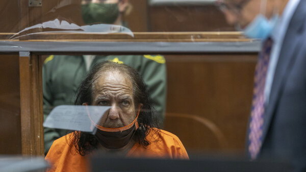 Adult film star Ron Jeremy listens as his attorney Stuart Goldfarb speaks during his arraignment on rape and sexual assault charges at Clara Shortridge Foltz Criminal Justice Center in Los Angeles on June 26, 2020.