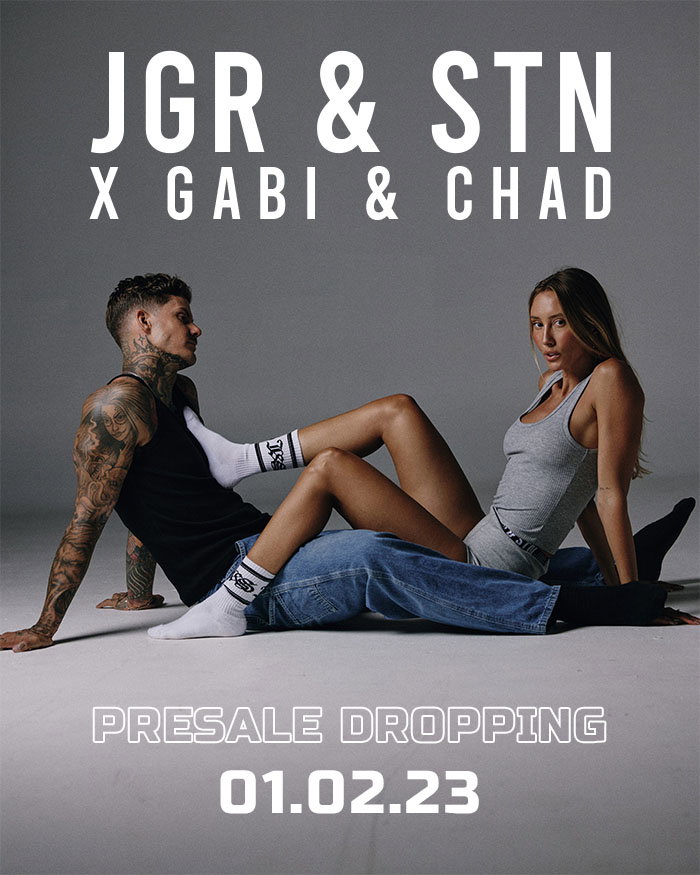 Gabi Sullivan and Chad edit. Grey tank white socks sport fashion